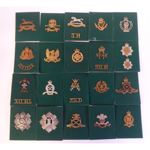 201 - A miscellaneous collection of Regimental cap badges and insignia, each mounted on card and identifie... 