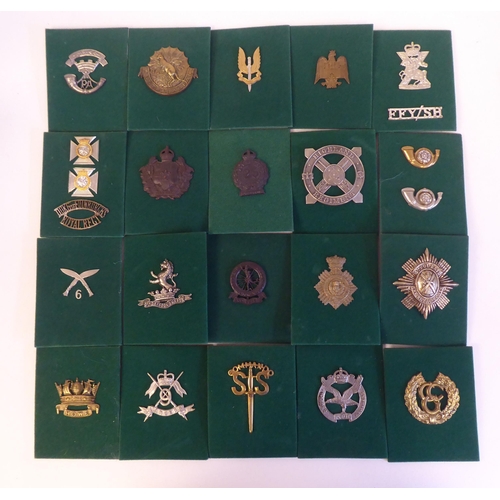 201 - A miscellaneous collection of Regimental cap badges and insignia, each mounted on card and identifie... 