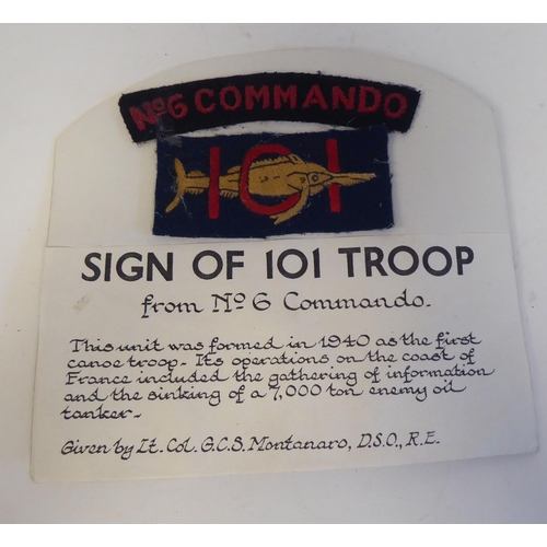 202 - A World War II 101 Troop 6 Commando fabric insignia, mounted on card(Please Note: this lot is subjec... 