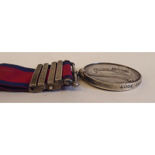 204 - A Victorian military General Service medal, awarded to William May, 57th Regiment Foot with four bar... 