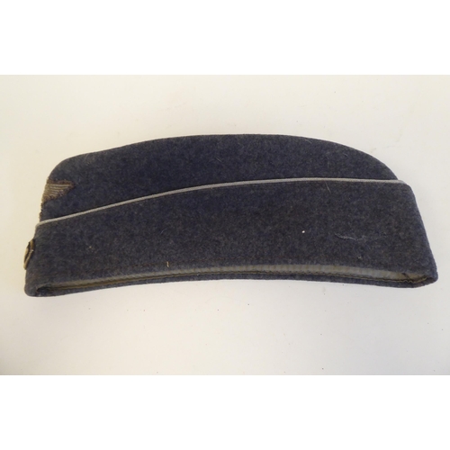 211 - A World War II German Luftwaffe cloth side cap(Please Note: this lot is subject to the statement mad... 