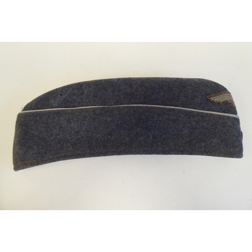 211 - A World War II German Luftwaffe cloth side cap(Please Note: this lot is subject to the statement mad... 