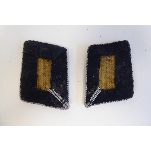 212 - A pair of World War II German SS Officer's silver wire cloth collar patches(Please Note: this lot is... 