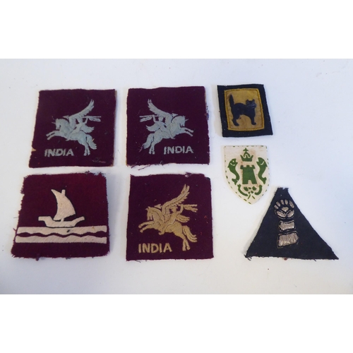 217 - Approximately twenty military cloth badges, some copies: to include Indian Army(Please Note: this lo... 