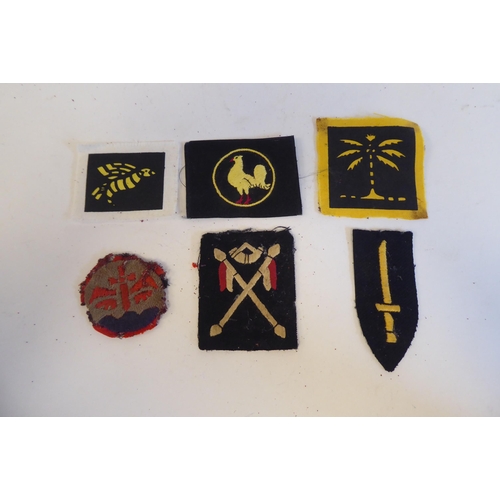 217 - Approximately twenty military cloth badges, some copies: to include Indian Army(Please Note: this lo... 