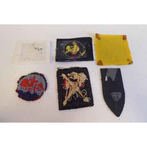 217 - Approximately twenty military cloth badges, some copies: to include Indian Army(Please Note: this lo... 