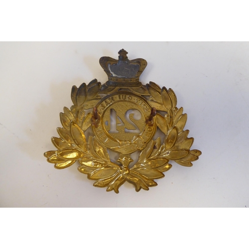 218 - 24th Foot military collectables, viz. two Shako plates; and a belt buckle(Please Note: this lot is s... 