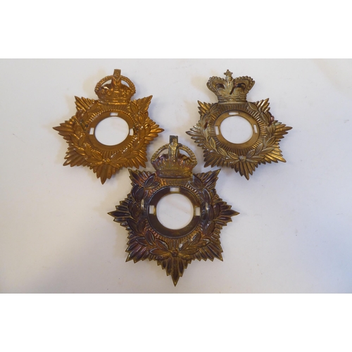 219 - Seven military metal helmet plates and badges, some copies: to include The Welsh Regiment Cyclists(P... 