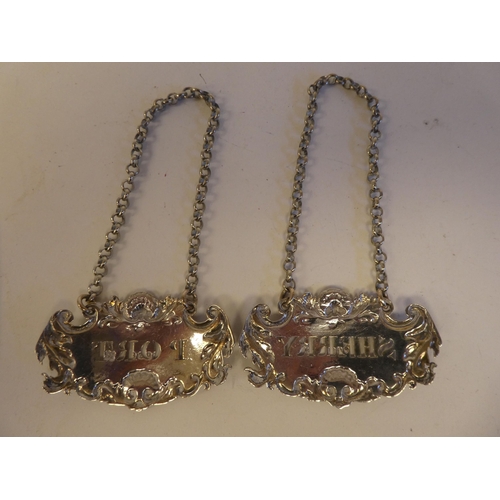 252 - Two white metal decanter labels, viz. 'Port' and 'Sherry'