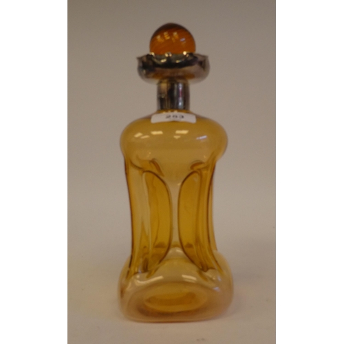 253 - A late Victorian amber tinted glass cluck-cluck decanter with a stopper and silver collar  Sheffield... 