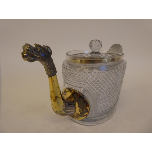 254 - A 19thC teapot with a gilded band lid, a part-frosted handle, fashioned as a serpent and the spout a... 