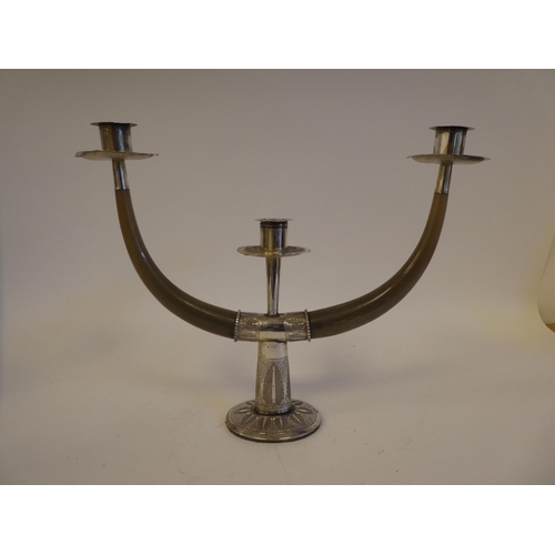 259 - A pair of Malaysian white metal mounted and horn, twin branch pedestal candelabra  bears impressed m... 