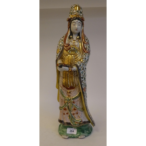 264 - An early 20thC Japanese porcelain figure 'Goddess Kannon' wearing multi-coloured and gilded robes  2... 