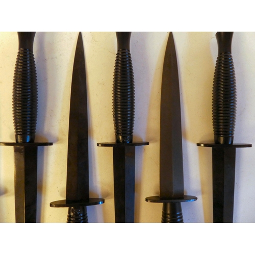 266 - Six unissued Commando fighting knives  the blades 7