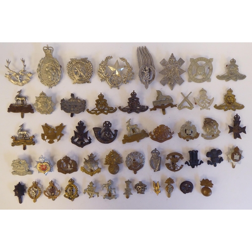 267 - Approximately fifty military metal cap badges, some copies: to include '5th London Brigade' (Pl... 