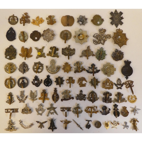 268 - Approximately seventy military metal cap badges, some copies: to include 'Egypt Gloucestershire Regi... 