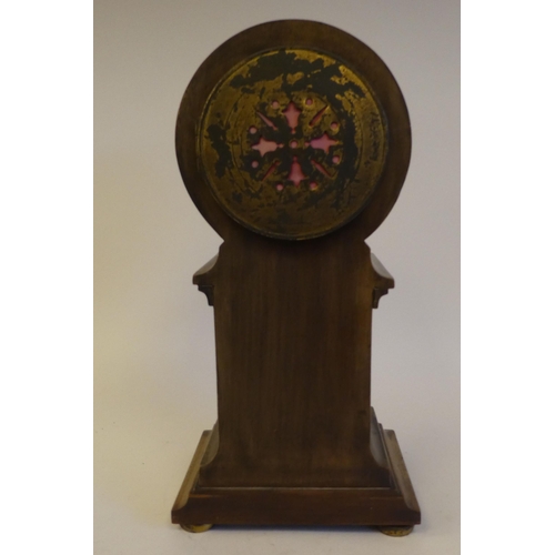 279 - An Edwardian string inlaid mantel clock of tower form, on a plinth and bun feet; the movement faced ... 