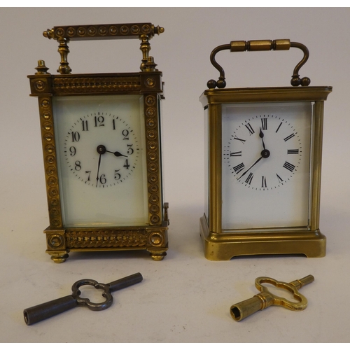 281 - Two 20thC lacquered brass and bevelled glass cased carriage timepieces, one faced by a Roman dial, t... 