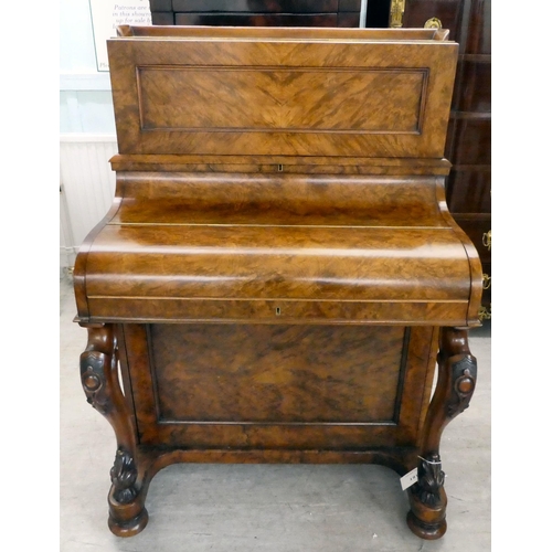 293 - A late Victorian walnut piano Davenport, the box top section with a rising panel, enclosing a pigeon... 