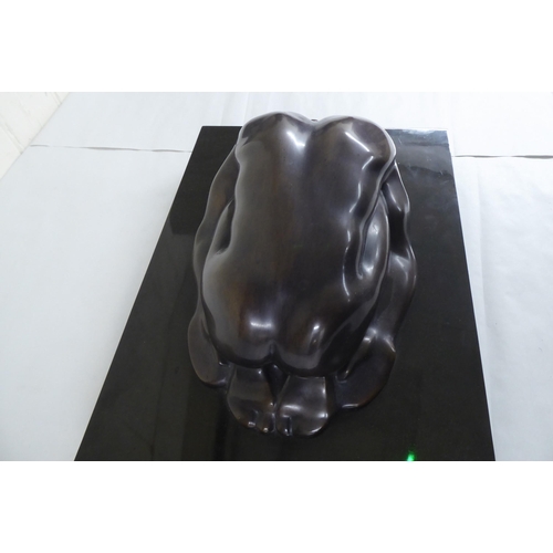 58 - Ayonso - a bronze male nude sculpture  bears a signature & dated '73 on a fixed plinth ... 