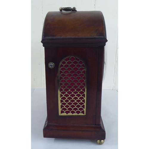 71 - A circa George III mahogany cased mantel clock; the chain driven bell strike movement faced by a Rom... 