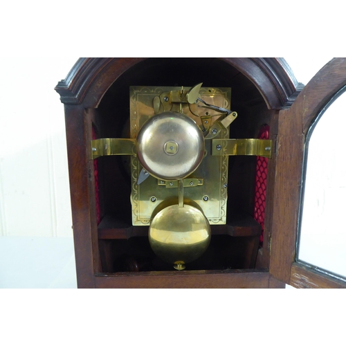 71 - A circa George III mahogany cased mantel clock; the chain driven bell strike movement faced by a Rom... 