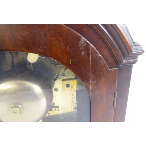 71 - A circa George III mahogany cased mantel clock; the chain driven bell strike movement faced by a Rom... 