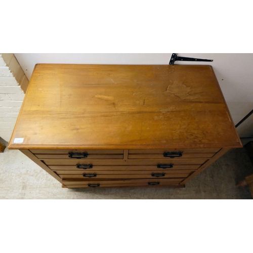 89 - An Edwardian bleached mahogany, five drawer dressing chest, on a plinth and block feet  41