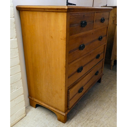 89 - An Edwardian bleached mahogany, five drawer dressing chest, on a plinth and block feet  41