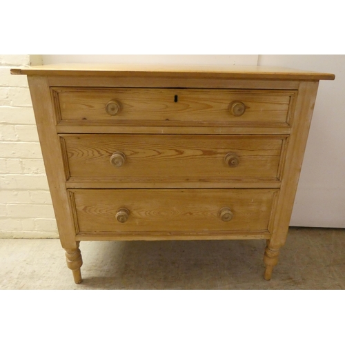 90 - An early 20thC pine, three drawer dressing chest, raised on turned legs  32