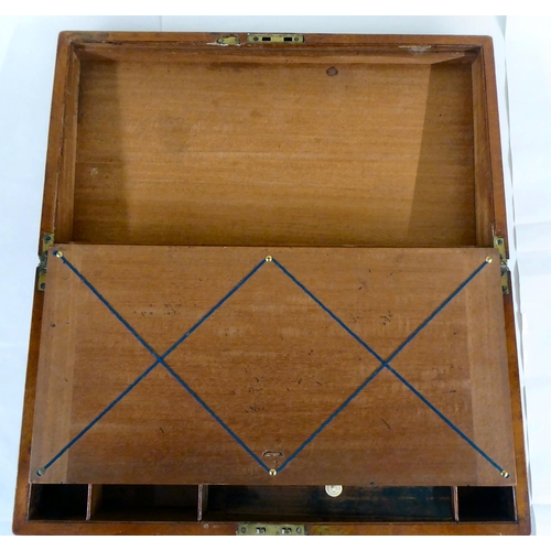 94 - A mid Victorian mahogany writing slope with straight sides and hinged lid, enclosing a part-fitted i... 