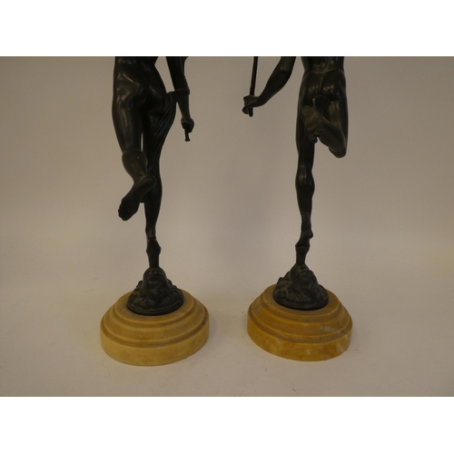 310 - A pair of late 19thC bronze studies, two classical figures, on marble plinths  18