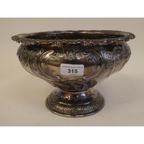 315 - A late Victorian silver pedestal bowl with a wavy lip and embossed swag ornament  Sheffield 189... 