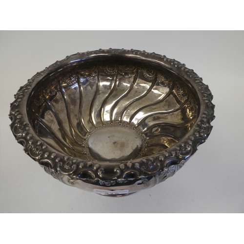 315 - A late Victorian silver pedestal bowl with a wavy lip and embossed swag ornament  Sheffield 189... 