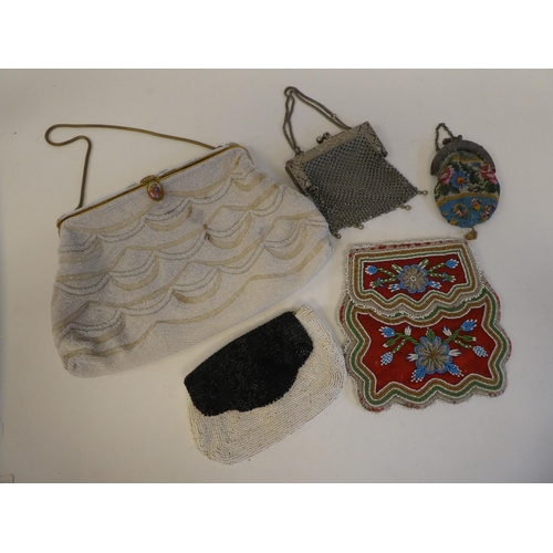 322 - Evening purses: to include micro beadwork and white metal examples