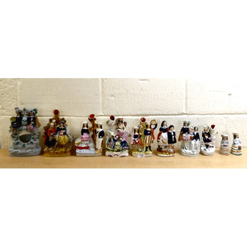 112 - Victorian Staffordshire pottery flatback figures: to include a man and woman, in Scottish dress ... 