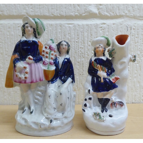 112 - Victorian Staffordshire pottery flatback figures: to include a man and woman, in Scottish dress ... 