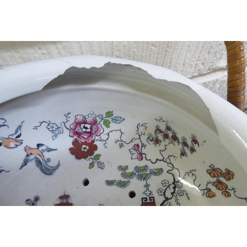 119 - Ceramics: to include a late Victorian Doulton Burslem china chamber pot, decorated with flora