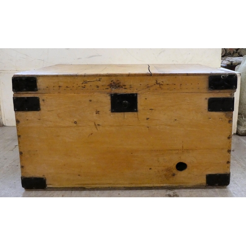 139 - A late Victorian pine blanket chest with a hinged lid and opposing handles, on a plinth  17