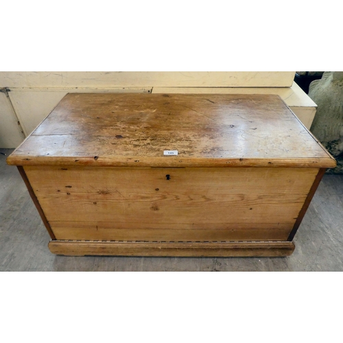 145 - A late Victorian pine blanket chest with a hinged lid and a fall front, on a plinth  18