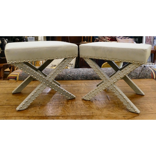 154 - A pair of modern stools, upholstered in grey fabric, decorated with studs  17