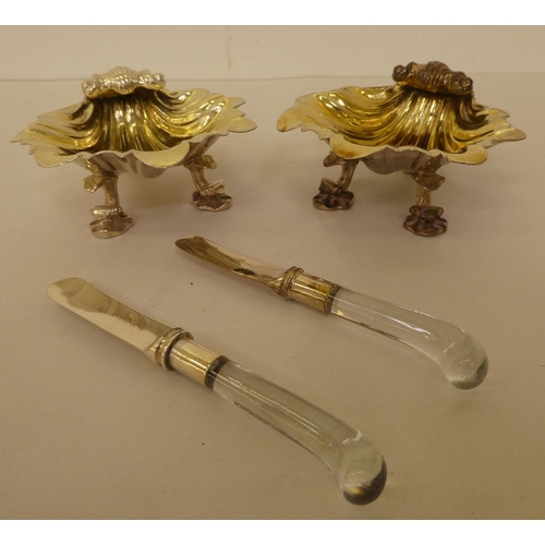 182 - A pair of silver gilt salt cellars of shell design, on cornucopia design feet  London 1837 and a pai... 