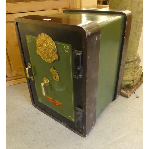 185 - A vintage Milner's cast iron safe  26