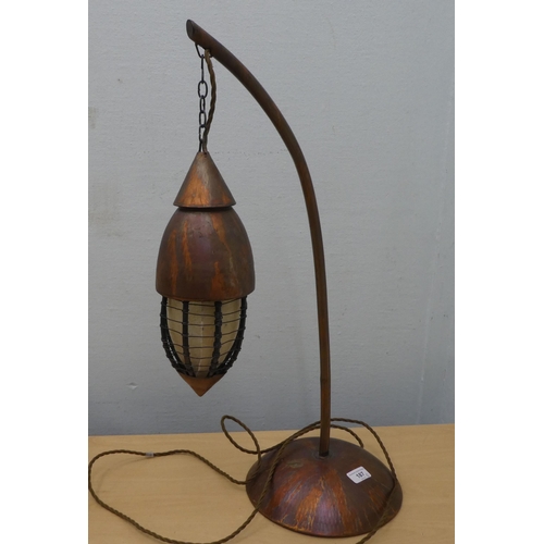 187 - A modern Arts & Crafts design copper finished metal table lamp with a frosted shade  27