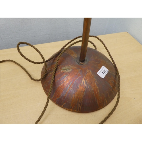 187 - A modern Arts & Crafts design copper finished metal table lamp with a frosted shade  27