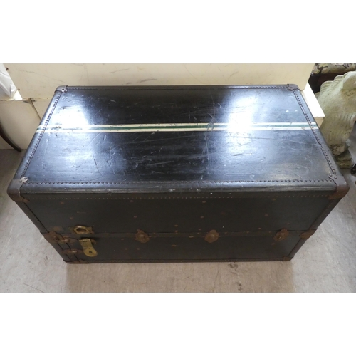 192 - An early 20thC Oshkosh travel trunk with a fitted interior  41