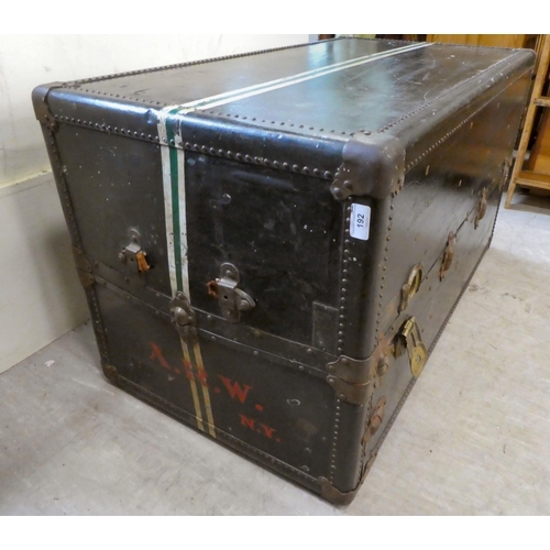 192 - An early 20thC Oshkosh travel trunk with a fitted interior  41