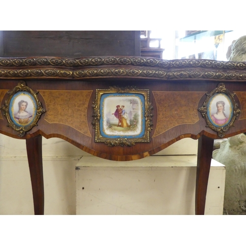 195 - A mid 19thC marquetry walnut, serpentine front card table with a foldover top, the frieze set with p... 