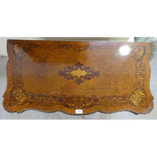 195 - A mid 19thC marquetry walnut, serpentine front card table with a foldover top, the frieze set with p... 