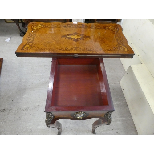 195 - A mid 19thC marquetry walnut, serpentine front card table with a foldover top, the frieze set with p... 